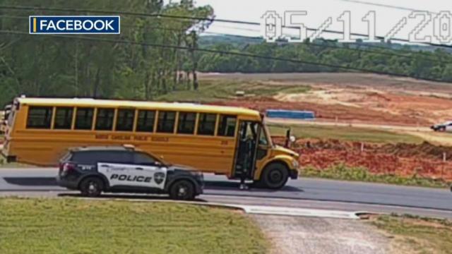 NC officer seen passing stopped school bus 