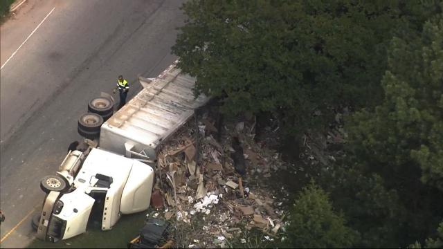 Truck dumps debris on Ellis Road near I-885 in Durham