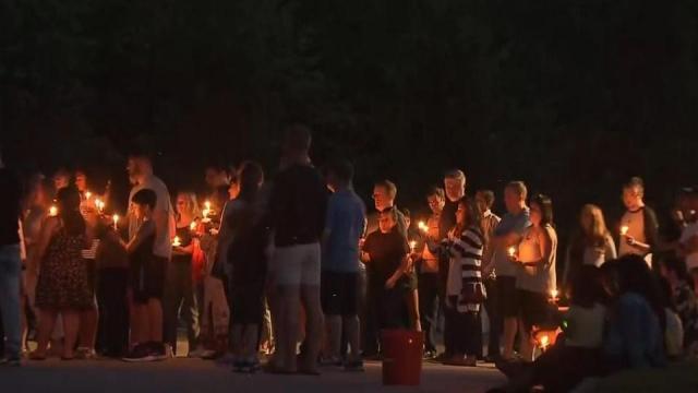Apex community holds candlelight vigil for child killed in scooter accident