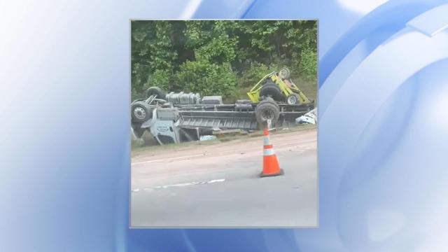 Highway Patrol: Flatbed truck overturns on I-540, driver possibly impaired