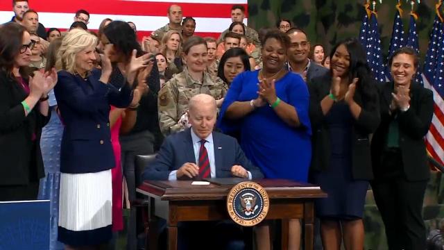 President Joe Biden talks to service members at Fort Liberty