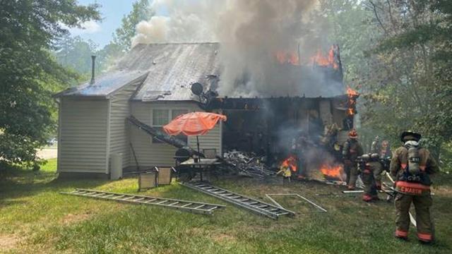 Fire destroys home in Durham, dog rescued