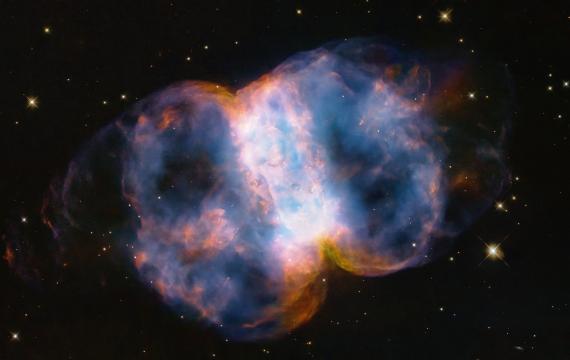 Hubble Space Telescope marks 34 years with new portrait of a ‘cosmic dumbbell’
