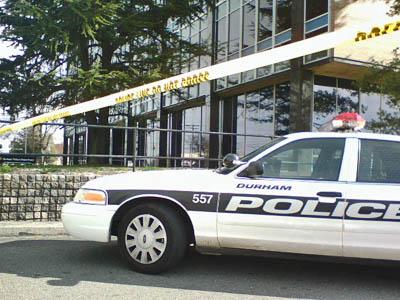 Yellow tape around Durham Police headquarters