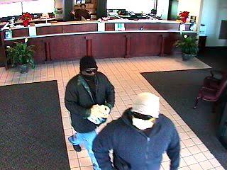 Police search for two in bank robbery