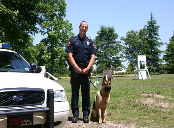 Cary police K-9 handler Jeremy Burgin and dog, Max