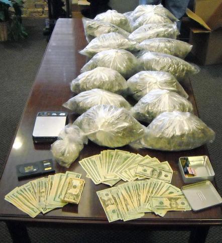 Marijuana and money seized from a Holly Springs home