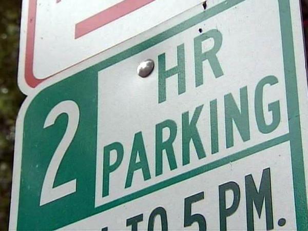 Downtown parking signs need fine print
