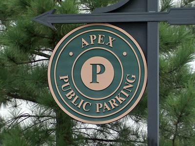 Apex store owners at odds with town manager over parking