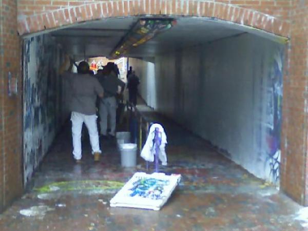 Racist graffiti was removed from N.C. State's "free expression tunnel" Wednesday morning.