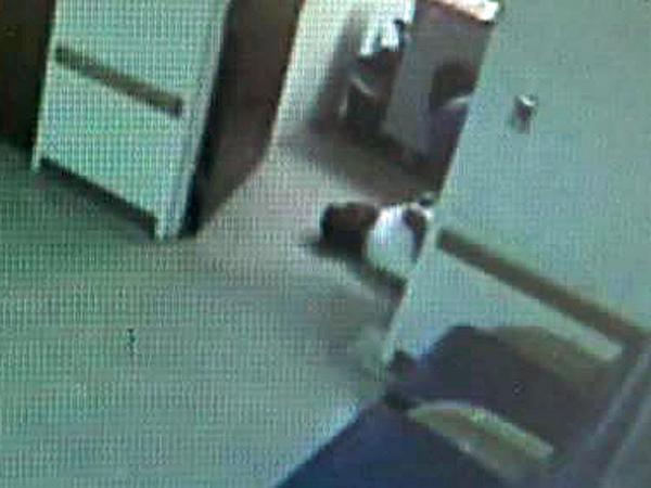 Surveillance video: Sabock hits his head, is helped up