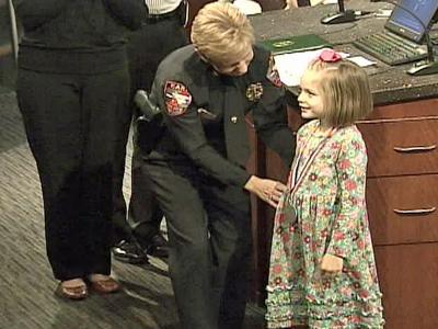 Cary 6-year-old honored for calm call to 911