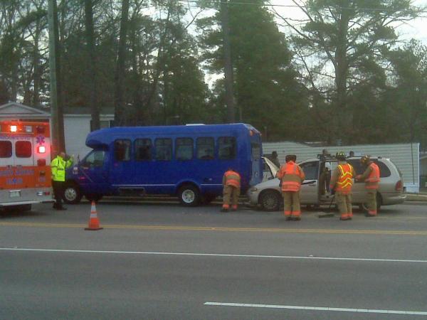 Bus, minivan crash in Cary