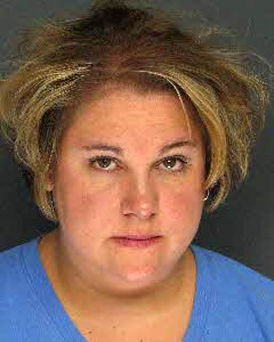 Jennifer Pruitt, charged with embezzling from school