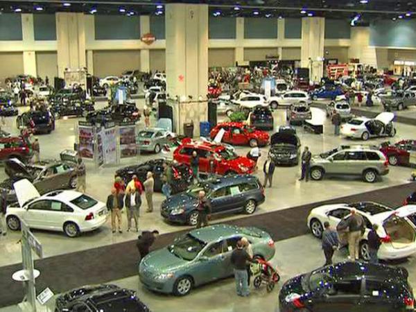 Auto show goes on, but without frills