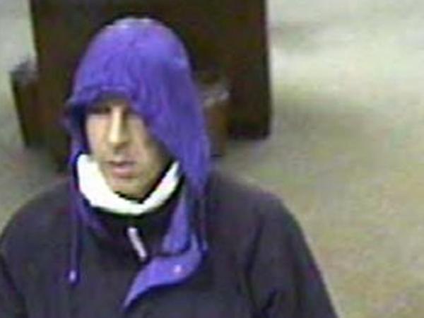 The man in these surveillance photos is a suspect in a bank robbery.