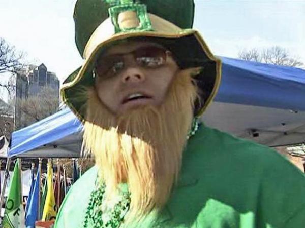 A big man dressed up as a little leprechaun for the St. Patrick's Day Festival in Moore Square in downtown Raleigh on Saturday, March 21, 2009.