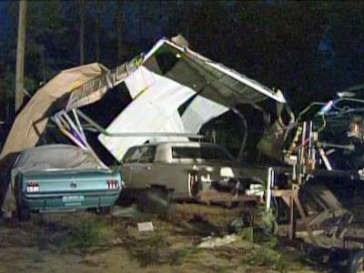 Two tornadoes injure woman, damage homes