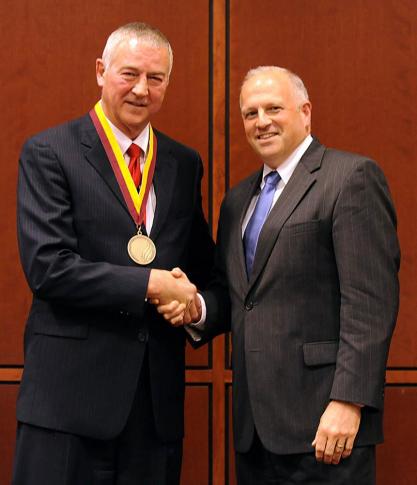 Elon University President Leo M. Lambert presented the school’s inaugural medal for entrepreneurial leadership to Jim Goodnight on Thursday.