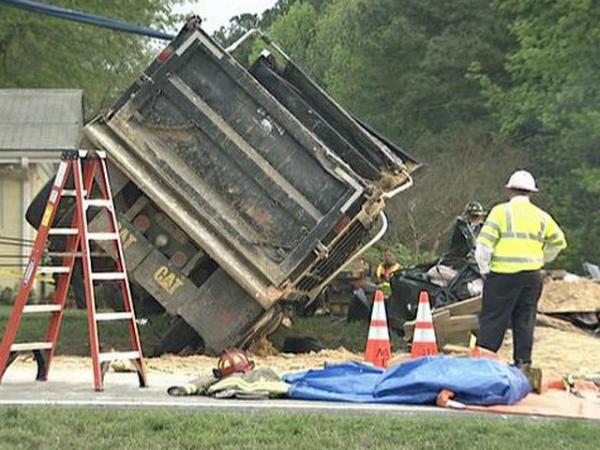 Paramedic rescues woman pinned by dump truck