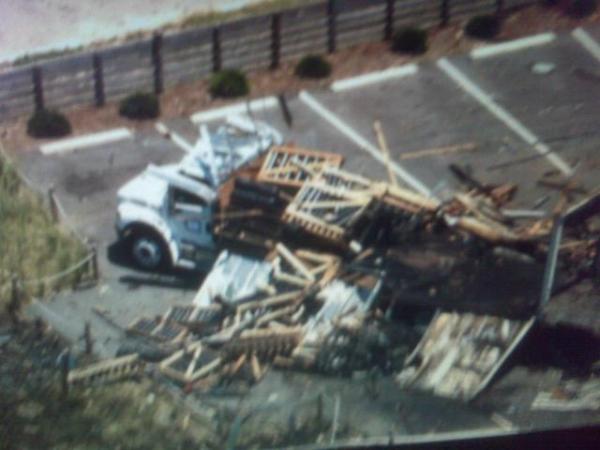07/04/09: Sky 5 hovers over Ocracoke Island damage