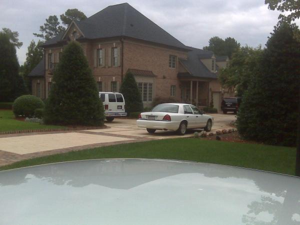 Authorities surrounded the Olde Raleigh home of William Wise Monday.