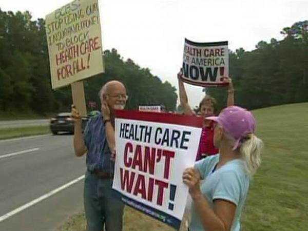 Workers urge Blue Cross to back health reform