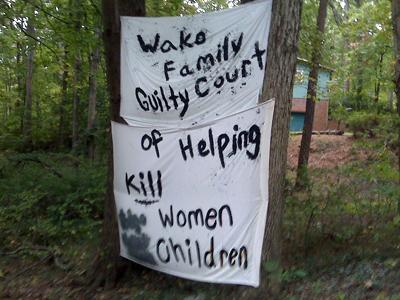 Raleigh woman fights Family Court with signs