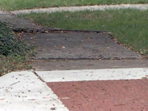 Advocates for disabled pan Durham sidewalks