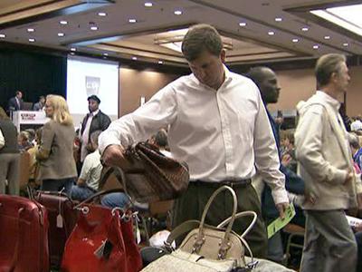 Former N.C. banker's luxury goods auctioned