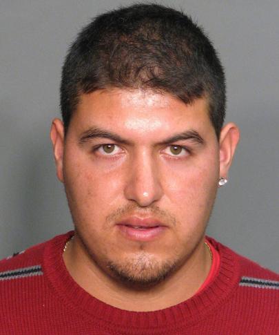 Ivan Aviles - mug shot 11/21/09 - Seven Raleigh men charged with