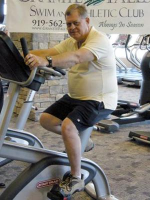 Rolesville Mayor Frank Eagles demonstrates his regular workout.