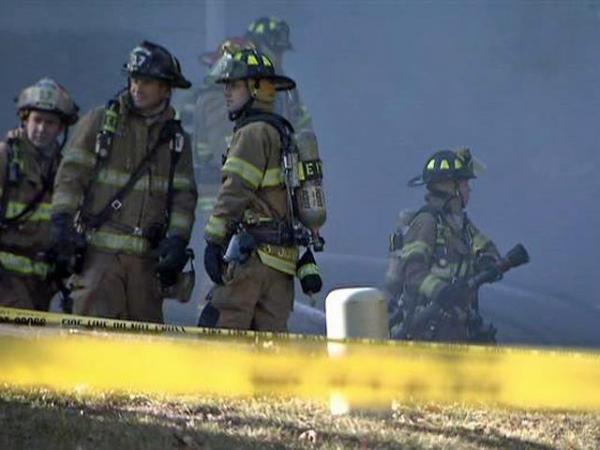 Firefighters battle flames, ice