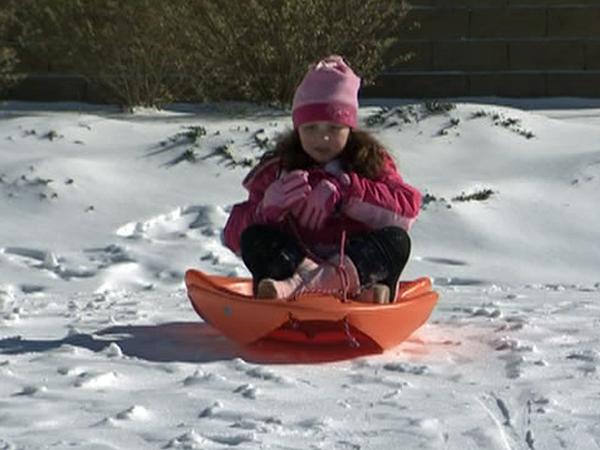 Children enjoying the snow in Wake Forest