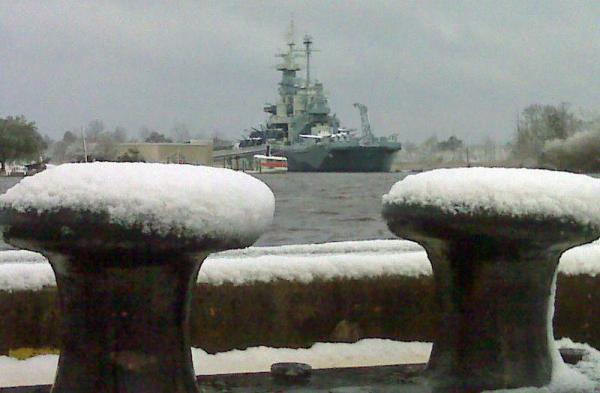 WRAL photojournalist Richard Adkins shared this picture of the USS North Carolina covered in snow at a Wilmington dock on Saturday, Feb. 13, 2010.