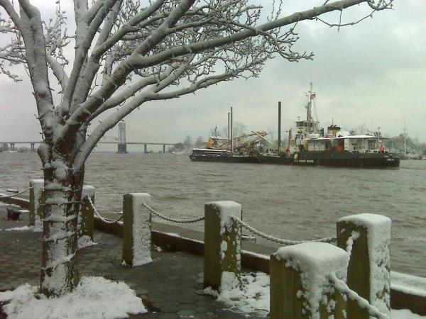 A Coast Guard ship sails out to patrol the Intercoastal Waterway during a snowy day in Wilmington on Saturday, Feb. 13, 2010.