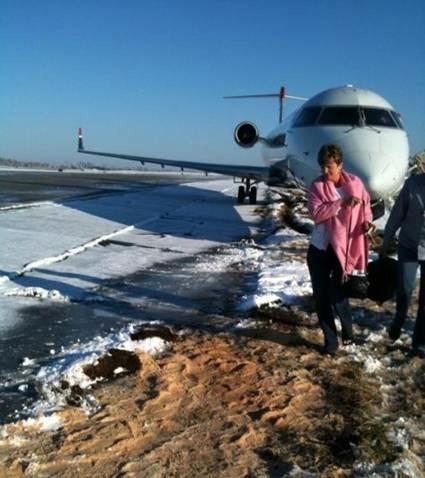 Plane hits ice, slides from Charlotte runway