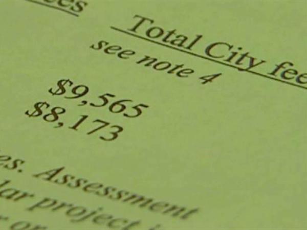 Neighborhood faces big fees for city services