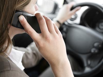 Ban cell phones while driving?