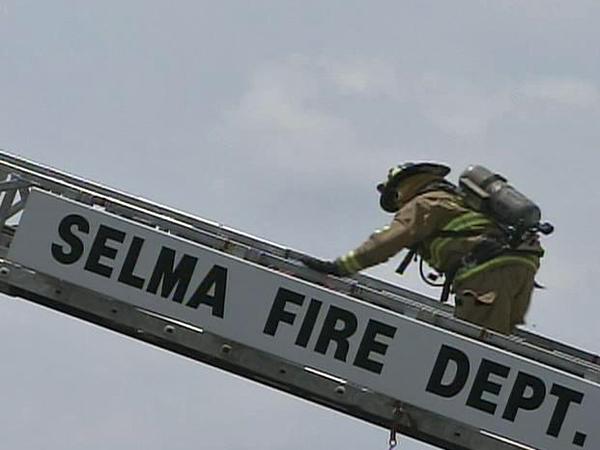 Firefighters battle Selma church fire
