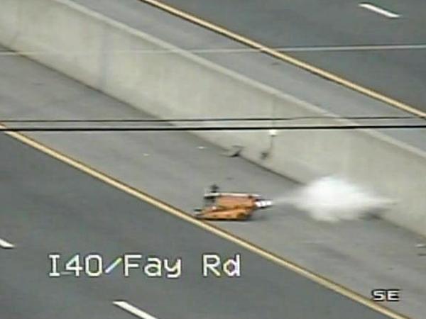 Motorized robot removes object from I-40