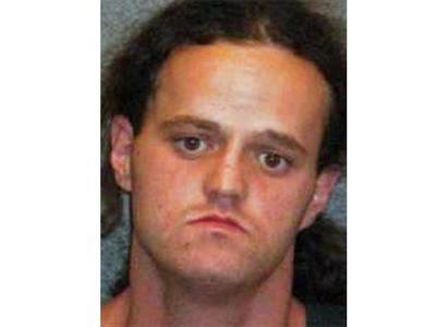 Man accused of carrying skeletal remains has criminal past