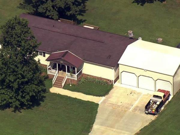 Durham police search Mebane home in hidden remains case