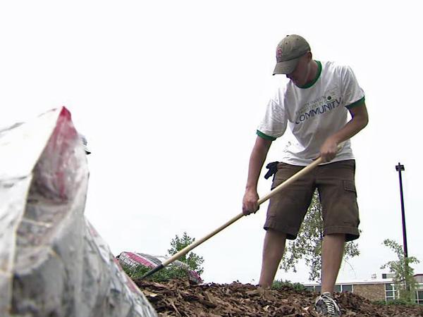 Volunteers improve grounds at Durham school