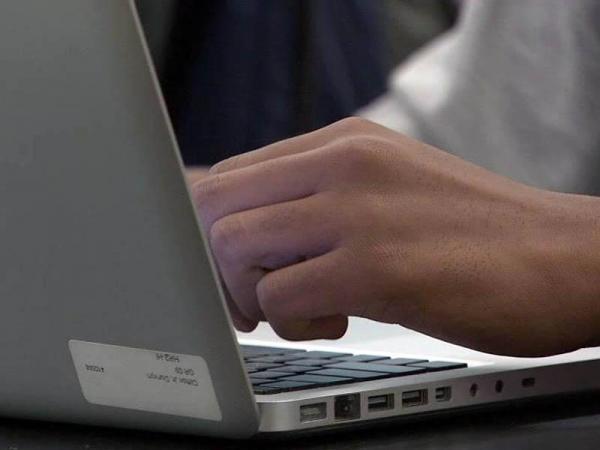 South Granville High passes out computers to students