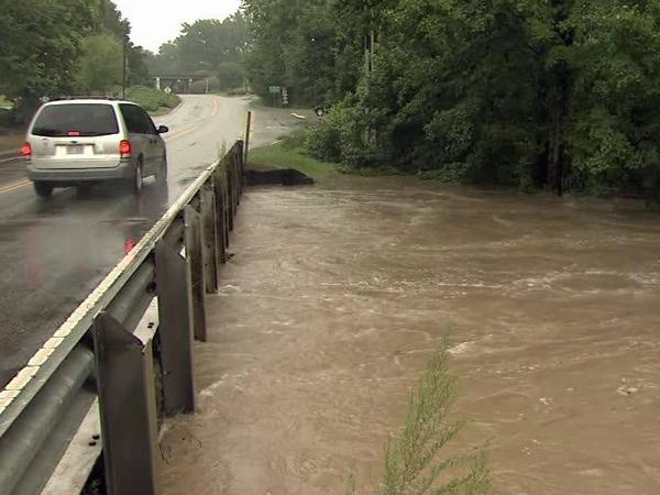 Heavy rain floods Little Creek in Clayton