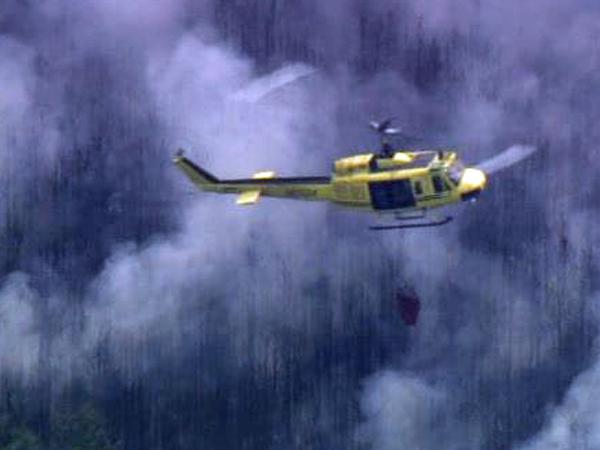 Fighters battle brush fire in Johnston County