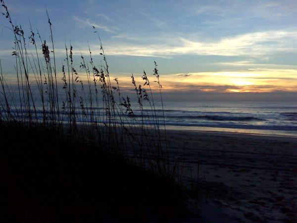 The sunrises over Carolina Beach on Oct. 1, 2010, a day after a massive rainstorm flooded downtown.