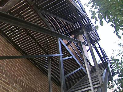 911 call: Men's bodies on fire escape for hours