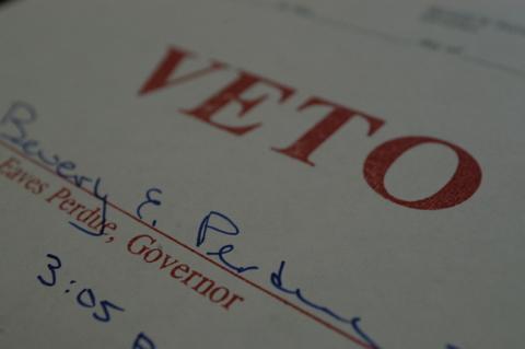 Perdue veto stamp